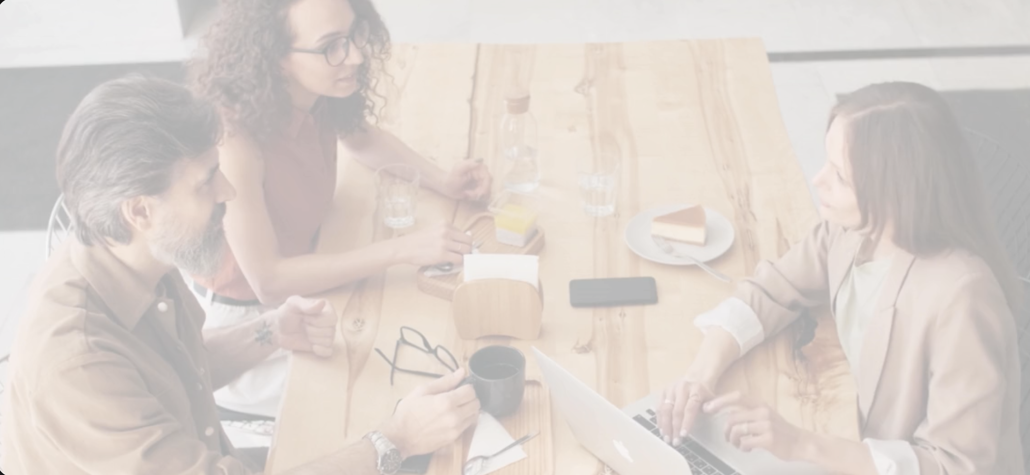 people sitting at a table talking