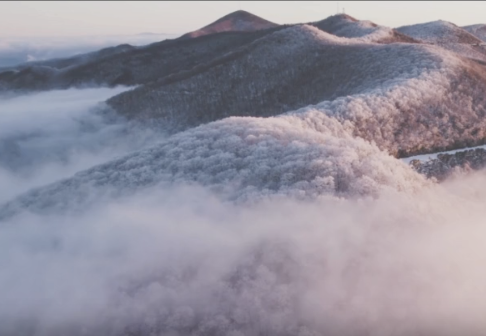 mountains in the clouds